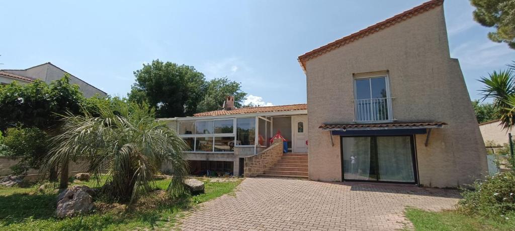 Photo de la galerie de l'établissement Maison avec jardin et piscine, à Juvignac
