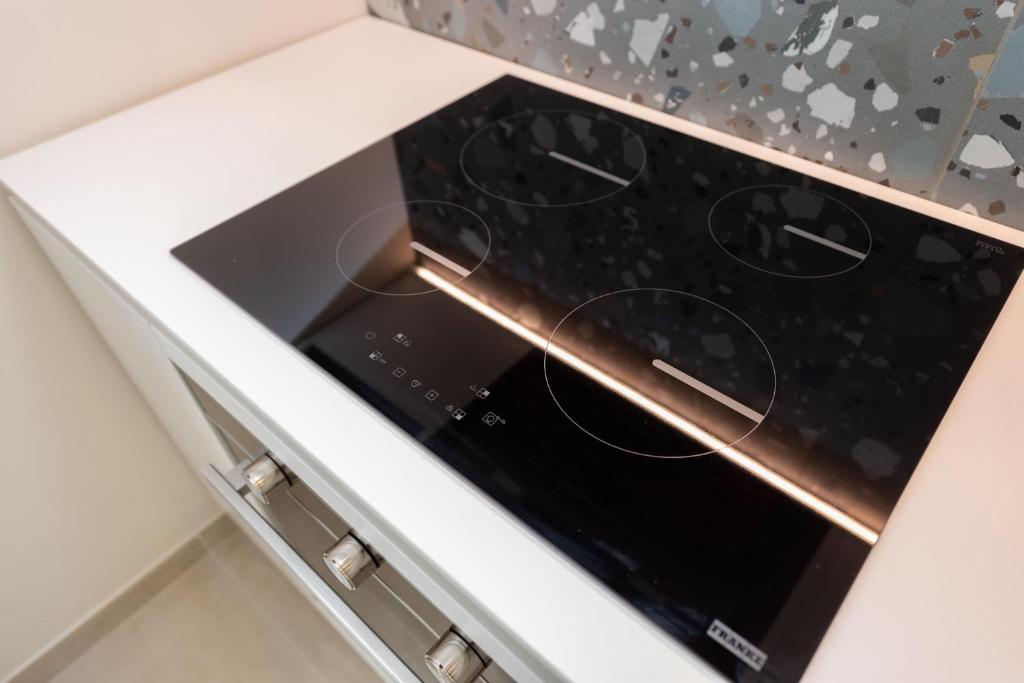 A kitchen or kitchenette at Hotel Carducci