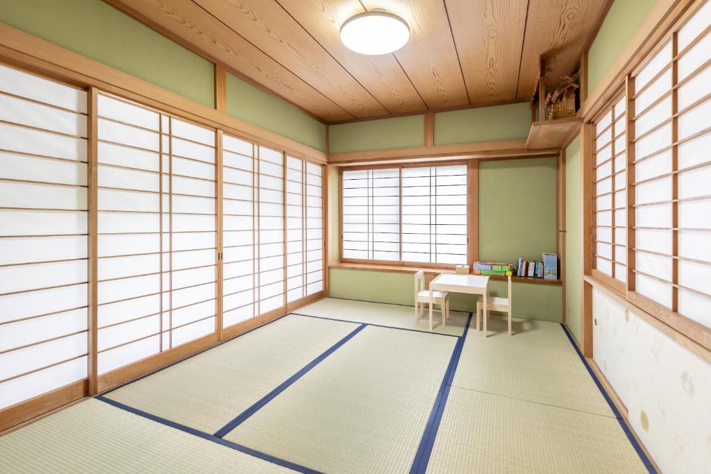 Fotografie z fotogalerie ubytování 温泉宿のんびり-天然温泉&絶景露天風呂付き貸切宿-非日常空間を愉しむ一10人でも広々 v destinaci Izu