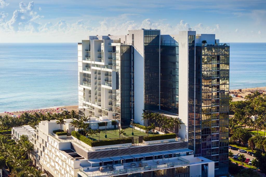 an aerial view of tall buildings near the ocean at W South Beach in Miami Beach