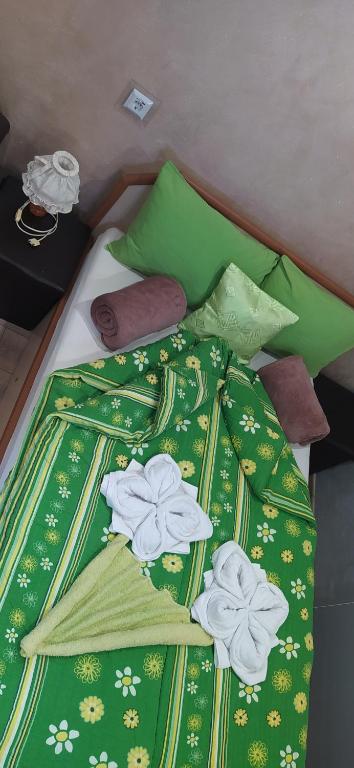 A bed or beds in a room at Velvita Sliven