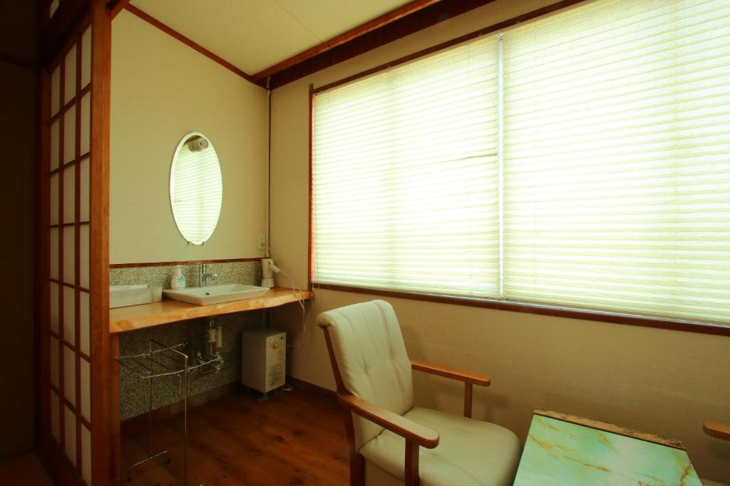 Fotografie z fotogalerie ubytování Family Ryokan Kawakyu with Showa Retro, private hot spring v destinaci Ibusuki