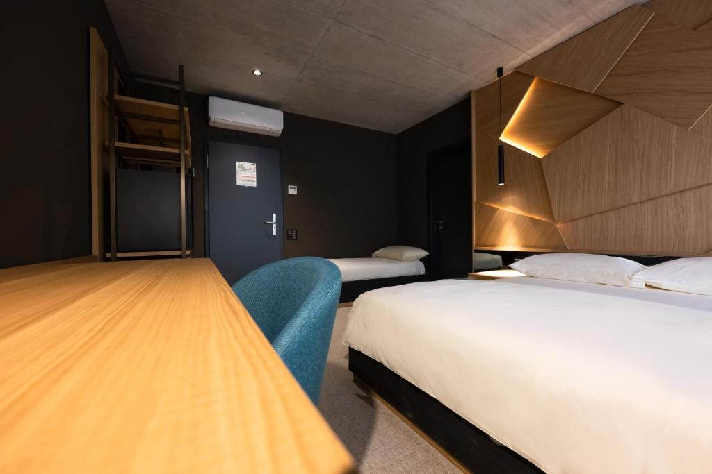 Postel nebo postele na pokoji v ubytování 6532 Smart Hotel - Self check-in