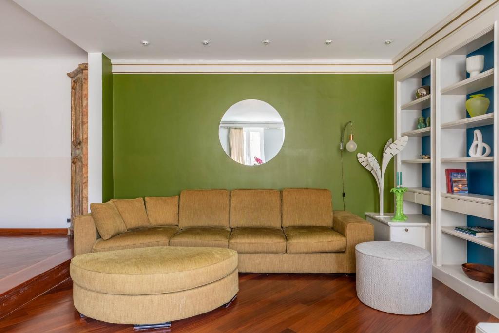 A seating area at iFlat Margutta Colors on Canvas Apartment