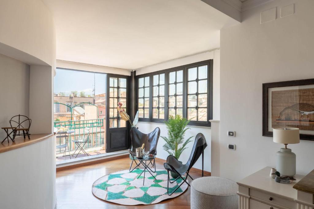 A seating area at iFlat Margutta Colors on Canvas Apartment