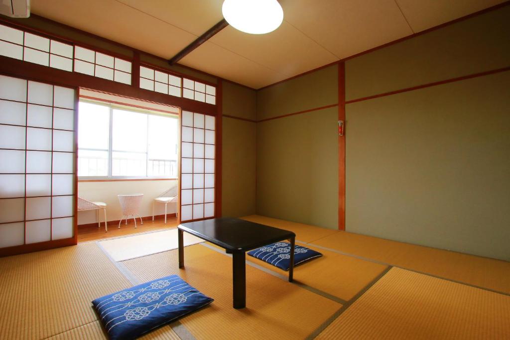 Fotografie z fotogalerie ubytování Family Ryokan Kawakyu with Showa Retro, private hot spring v destinaci Ibusuki
