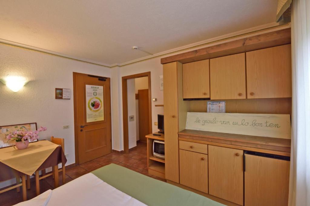 Kuchyň nebo kuchyňský kout v ubytování La Roche Hotel Appartments