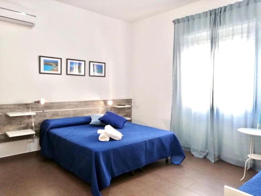 Postel nebo postele na pokoji v ubytování Noto Rooms #2