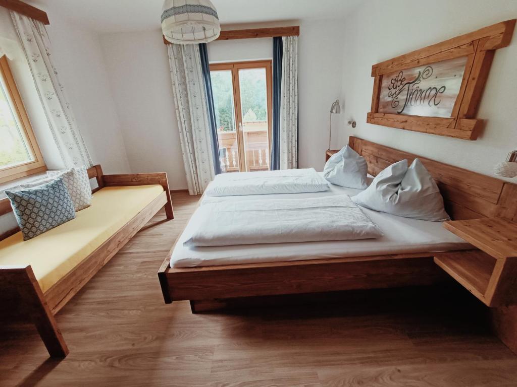 Postel nebo postele na pokoji v ubytování Ferienhof Mittermair