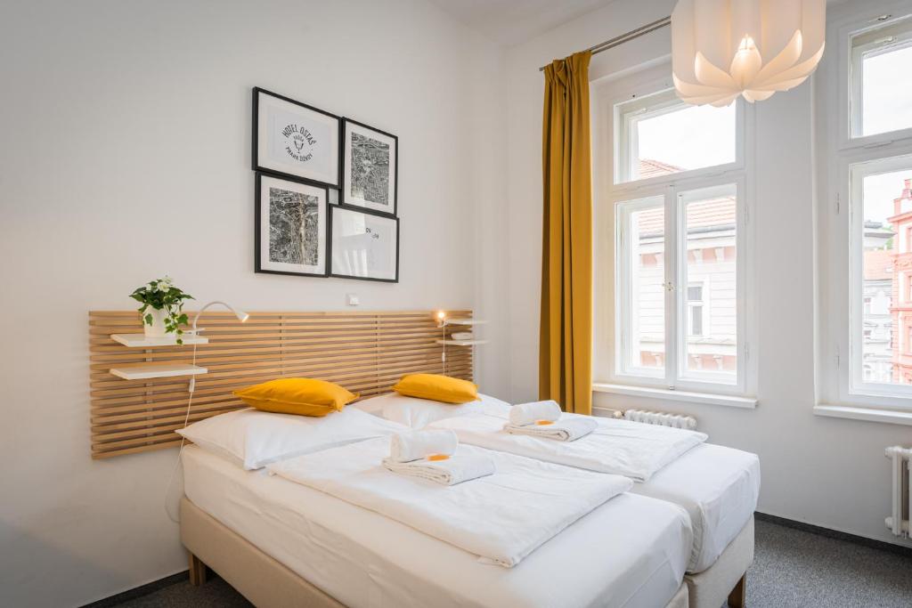 Postel nebo postele na pokoji v ubytování Self-service Hotel Ostaš Praha