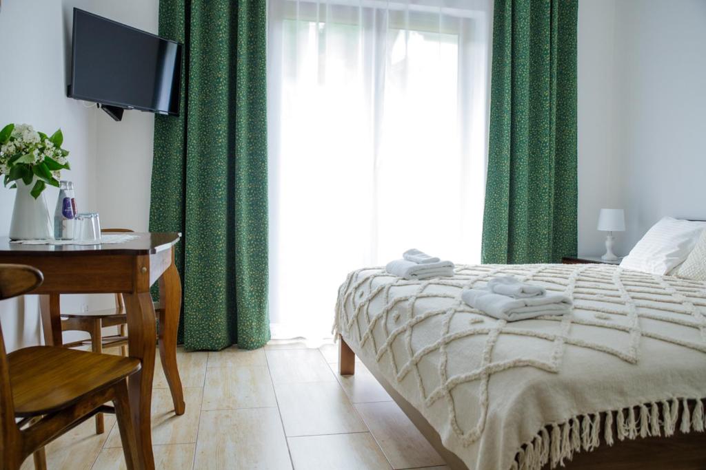 Letto o letti in una camera di Cudne Manowce