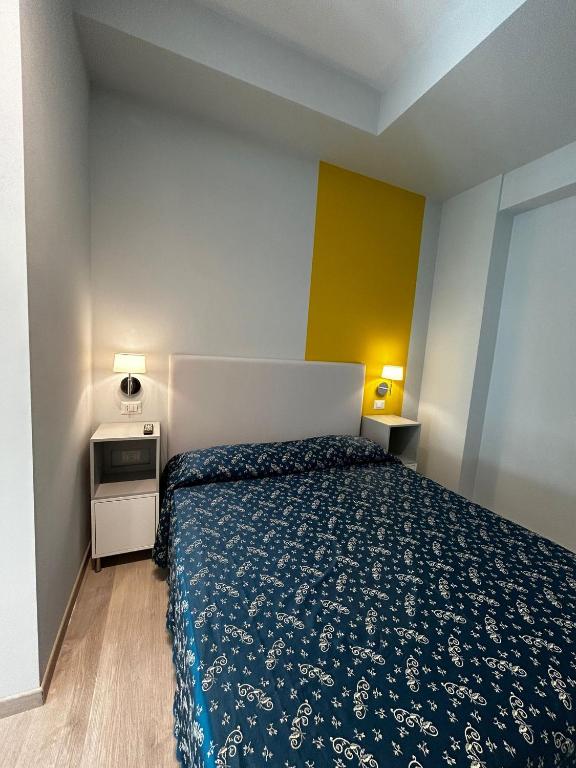 Postel nebo postele na pokoji v ubytování Hotel Sissi