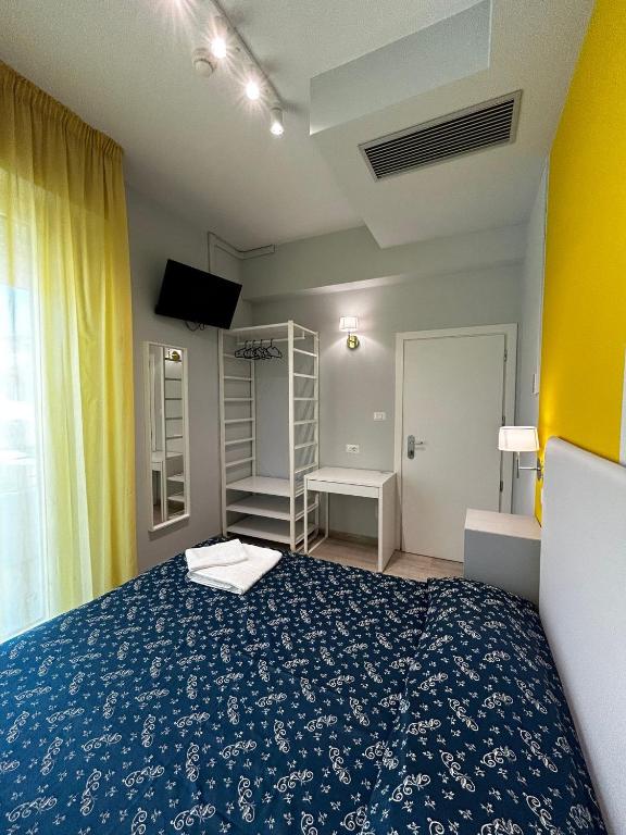 Postel nebo postele na pokoji v ubytování Hotel Sissi