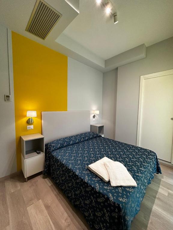 Postel nebo postele na pokoji v ubytování Hotel Sissi