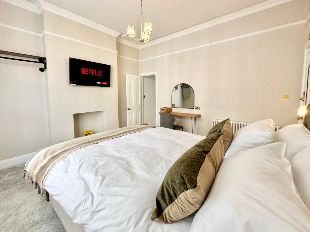 Postel nebo postele na pokoji v ubytování Portland Stay