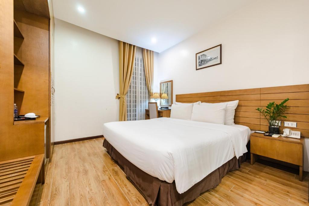 Postel nebo postele na pokoji v ubytování One Hotel