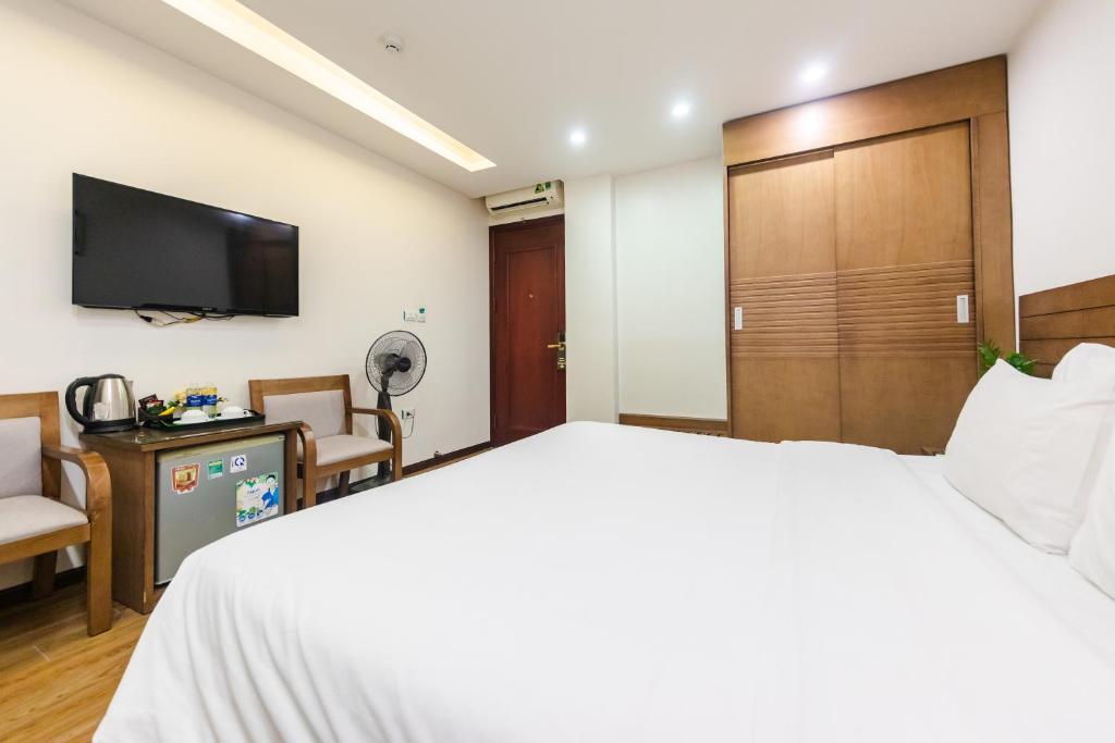 Postel nebo postele na pokoji v ubytování One Hotel