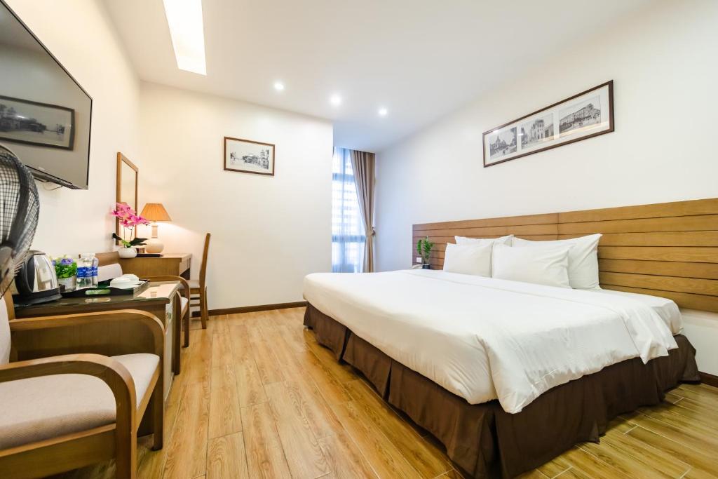 Postel nebo postele na pokoji v ubytování One Hotel