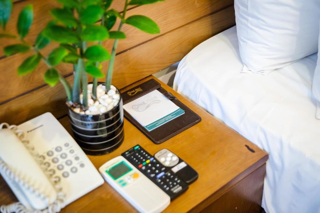 Postel nebo postele na pokoji v ubytování One Hotel