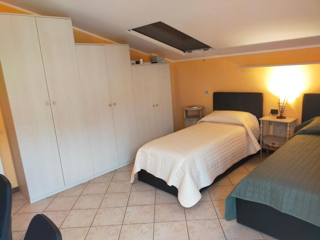Postel nebo postele na pokoji v ubytování Residenza Giulia e Marco