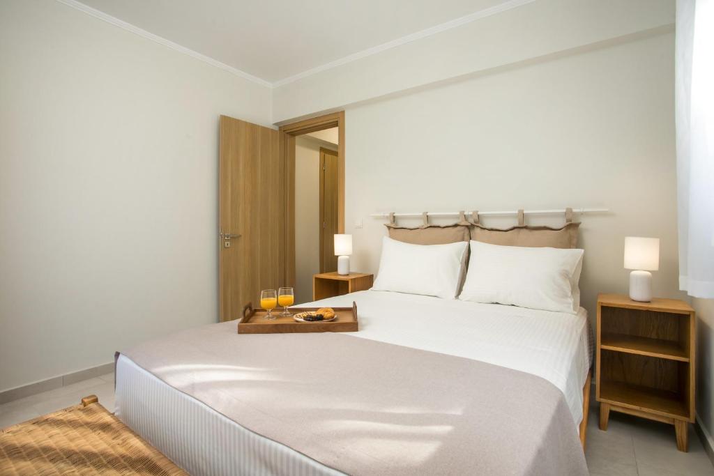 A bed or beds in a room at Beachfront Villa SeaShell Superior