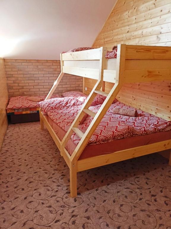 Postel nebo postele na pokoji v ubytování Chalupa Pod Menhiry
