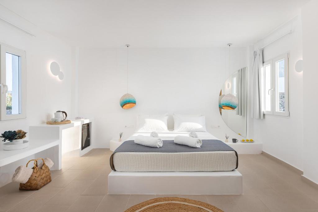 Postel nebo postele na pokoji v ubytování VOCA HOTEL & SUITES