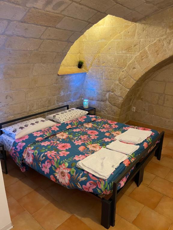 Postel nebo postele na pokoji v ubytování sassi low cost