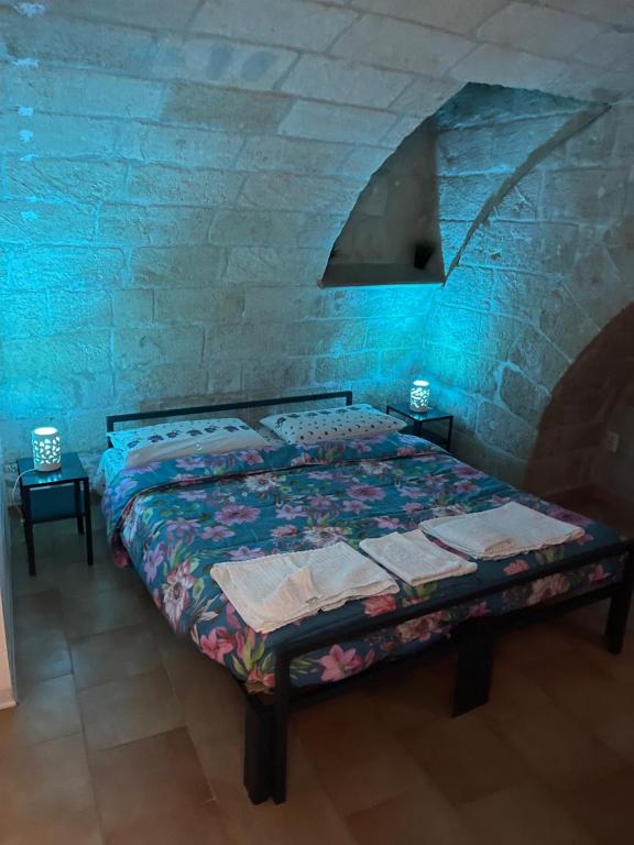 Postel nebo postele na pokoji v ubytování sassi low cost