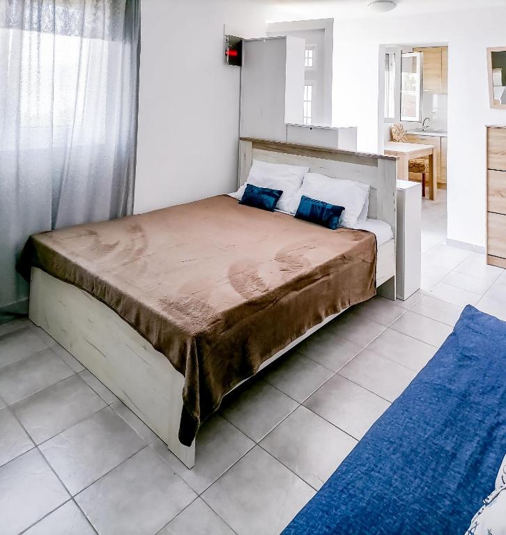 Postel nebo postele na pokoji v ubytování Apartments Siesta