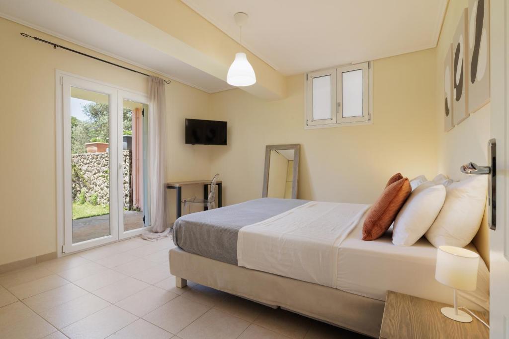 Postel nebo postele na pokoji v ubytování Luxury Villa Perla