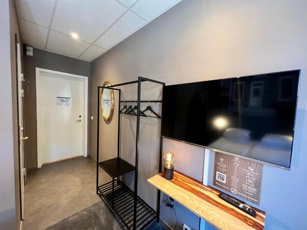 TV a/nebo společenská místnost v ubytování Hotell Siesta