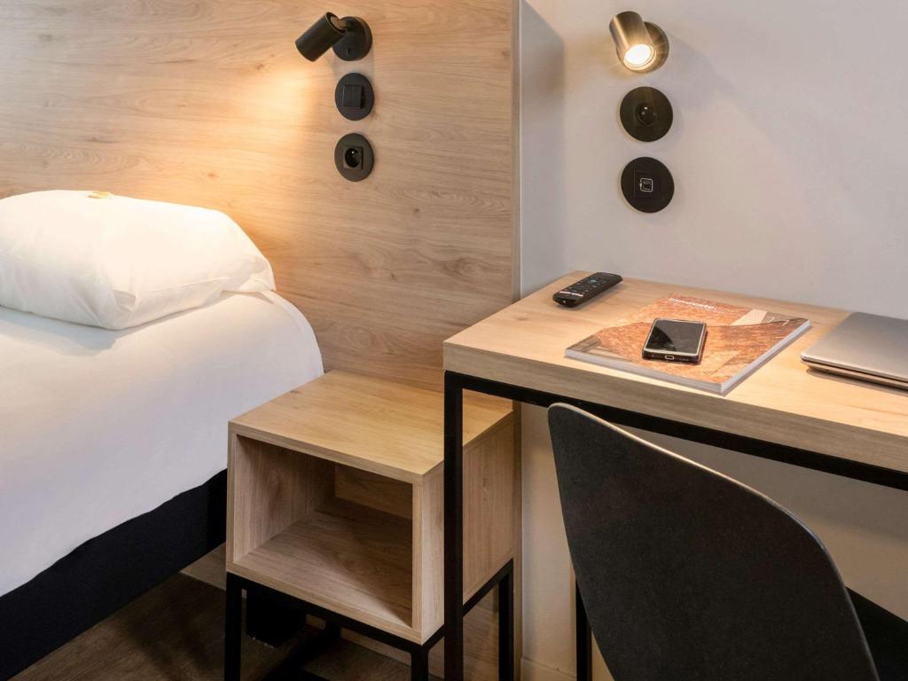 Postel nebo postele na pokoji v ubytování ibis Styles Namur