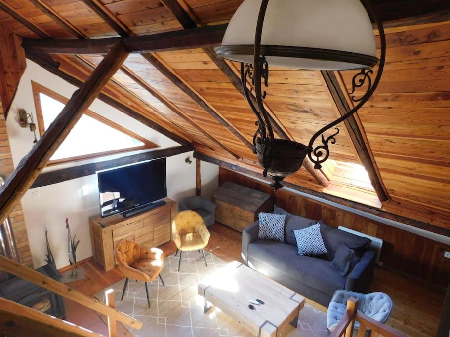 an overhead view of a living room with a couch at Chaleureuse Maison de pays Serre Chevalier4étoiles in Le Monêtier-les-Bains