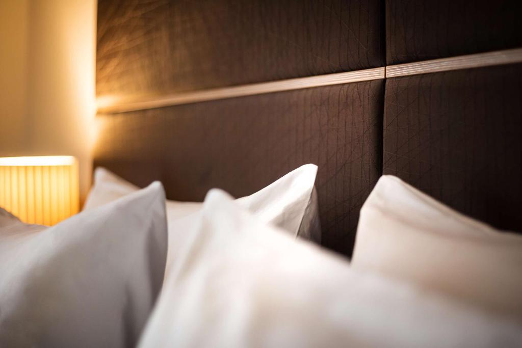Lindner Hotel Dusseldorf Airport, part of JdV by Hyattにあるベッド