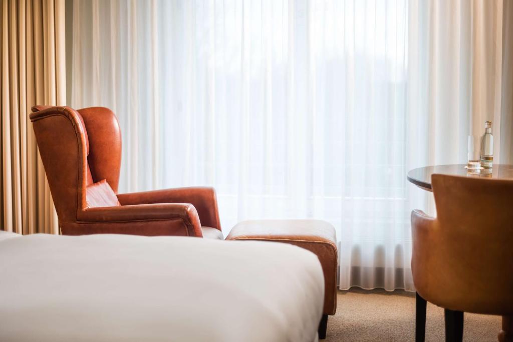 Lindner Hotel Dusseldorf Airport, part of JdV by Hyattにあるベッド