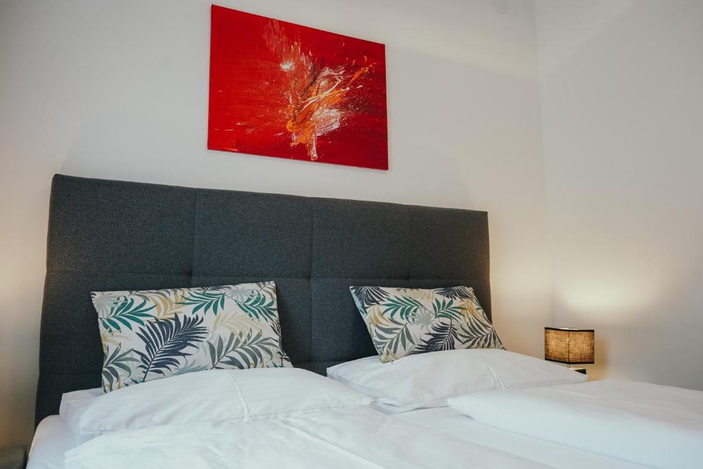 Postel nebo postele na pokoji v ubytování Pension Steinbichler - Apartments und Zimmer Check in 24-7