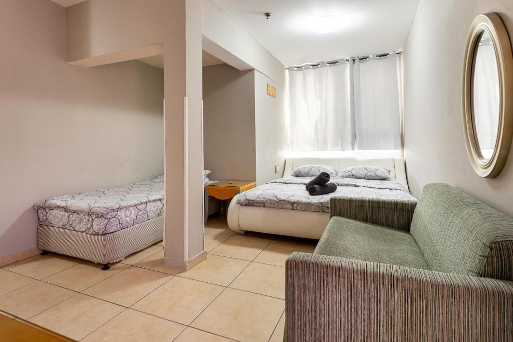 Ein Bett oder Betten in einem Zimmer der Unterkunft Little Prince Hostel-5 Min Walk To The Beach