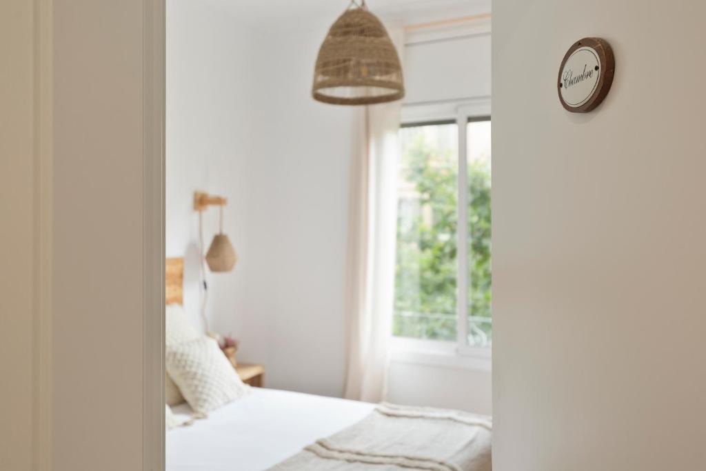 Posteľ alebo postele v izbe v ubytovaní KeyFamily Sweet Home