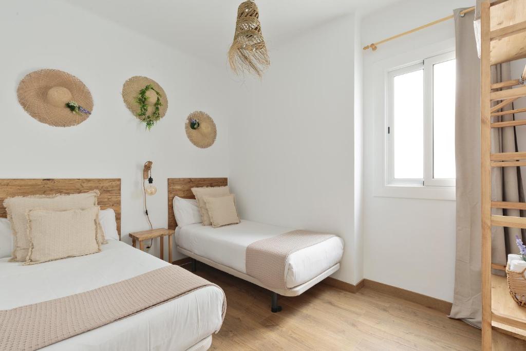 Posteľ alebo postele v izbe v ubytovaní KeyFamily Sweet Home