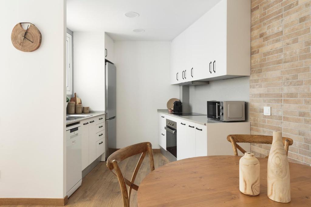 Kuchyňa alebo kuchynka v ubytovaní KeyFamily Sweet Home