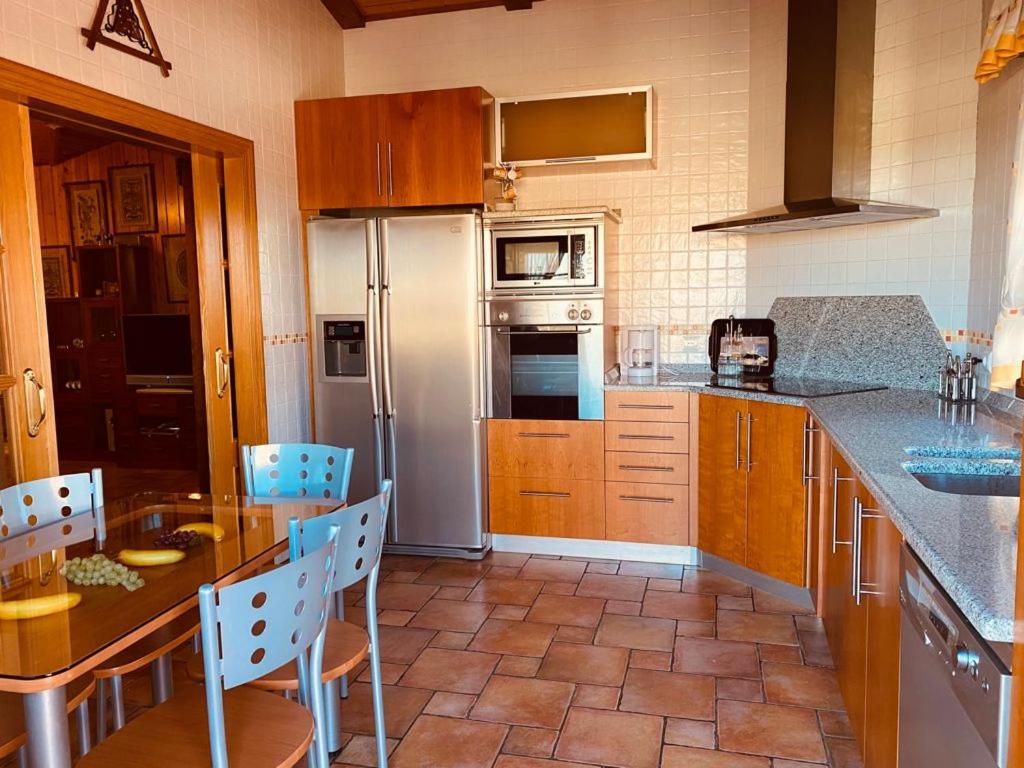 Kuchyň nebo kuchyňský kout v ubytování Apartamentos Numancia