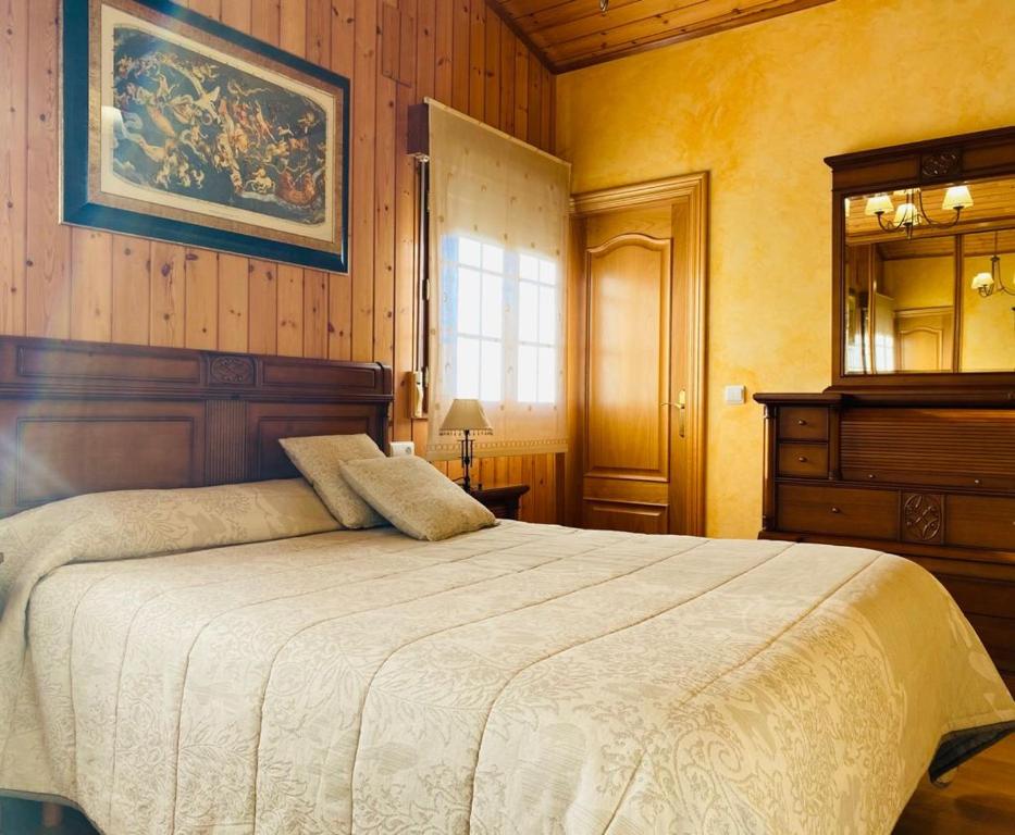 Postel nebo postele na pokoji v ubytování Apartamentos Numancia