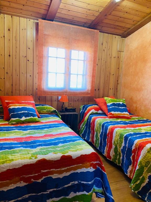 Postel nebo postele na pokoji v ubytování Apartamentos Numancia