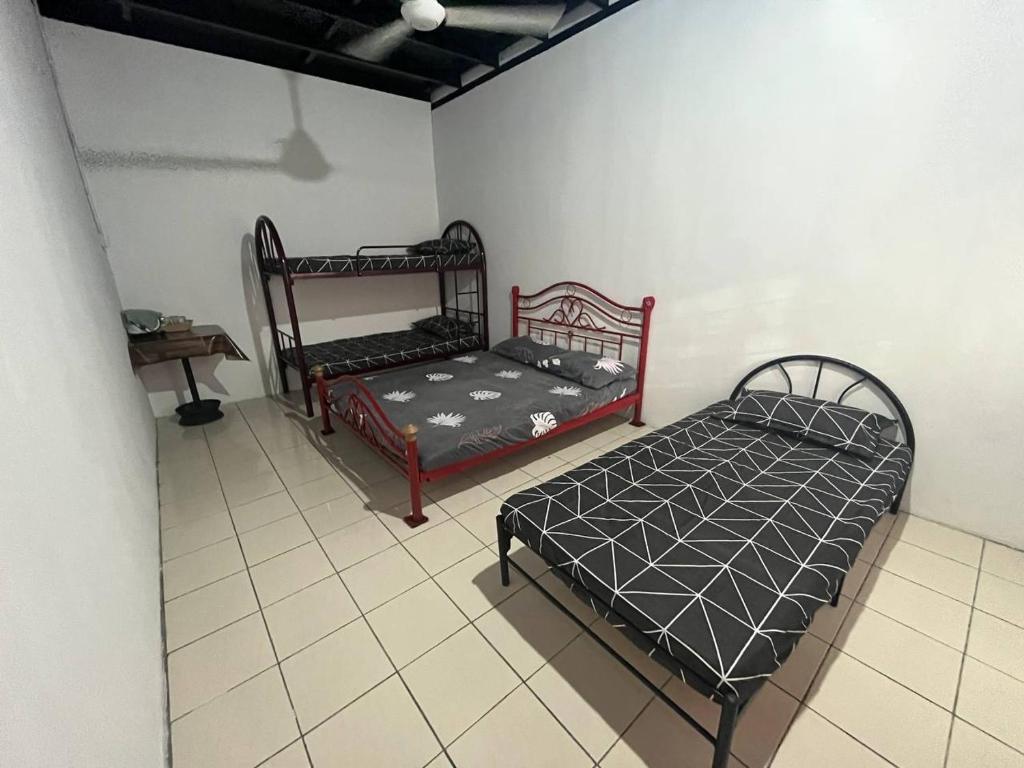 Krevet ili kreveti u jedinici u okviru objekta Julian Homestay