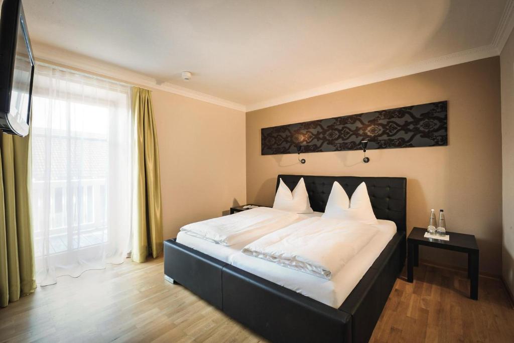 Postel nebo postele na pokoji v ubytování Wellness Natur Resort Gut Edermann