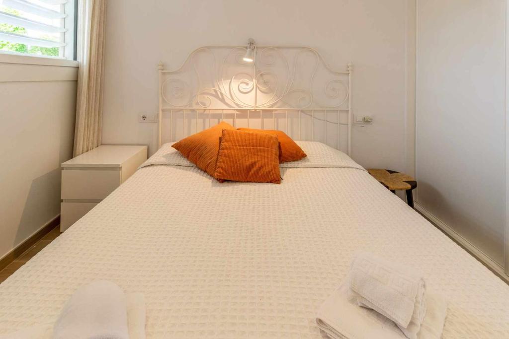 Posteľ alebo postele v izbe v ubytovaní Port de Llançà 29 Apartamento con vistas al mar