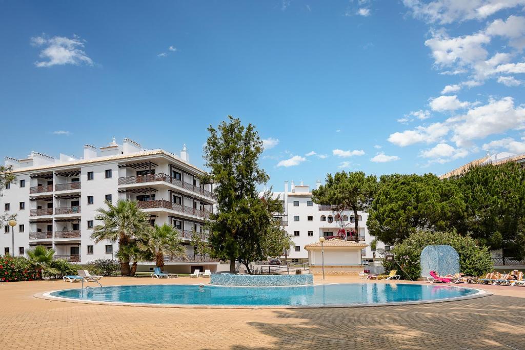 Elegance Apartment W Balcony & Pool by LovelyStay