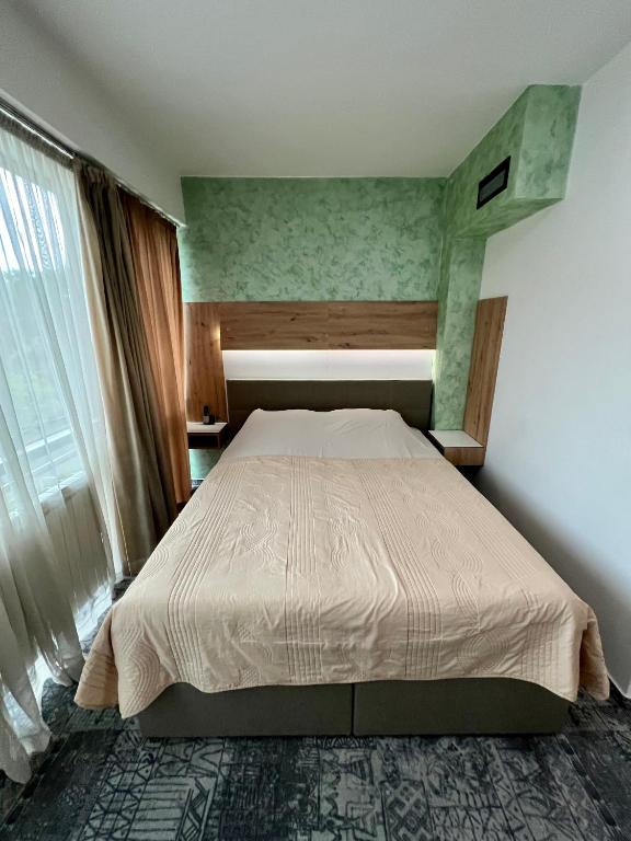Postel nebo postele na pokoji v ubytování Hotel Brkić Sarajevo Airport - Free Parking