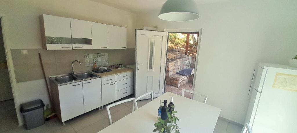 Kuchyň nebo kuchyňský kout v ubytování Apartman Bonkovic